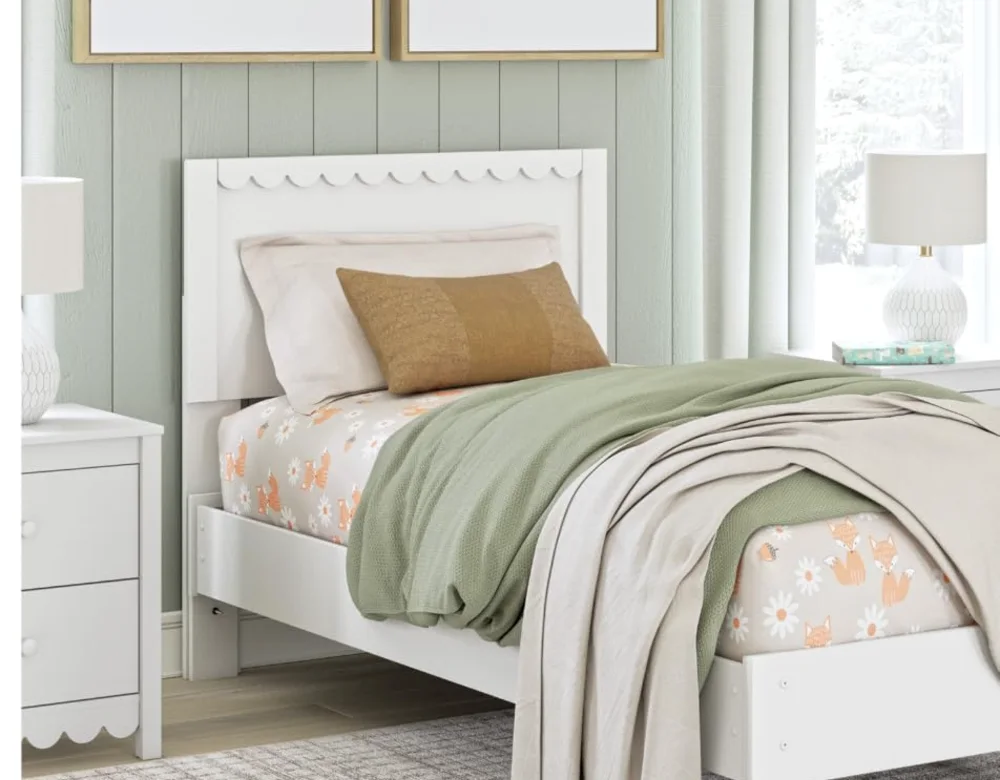 A bedroom furnished from one Ashley collection