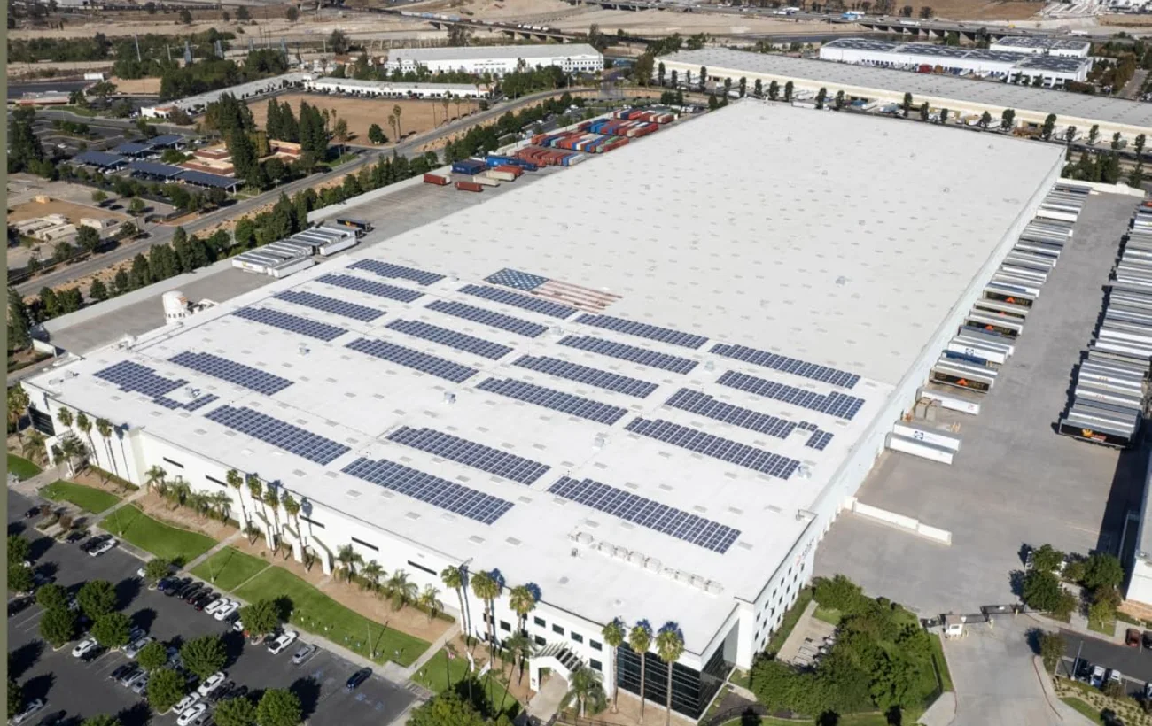 Aerial view of an Ashley distribution and manufacturing site, its roof covered in solar panels